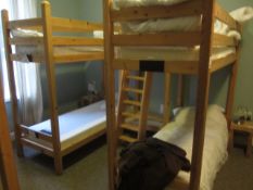 Twin Timber frame bunk bed with joined single stepped ladder access (room Modron). Please ensure