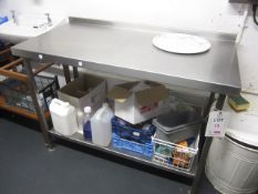 Stainless steel food preparation work surface with undershelf, approx. size: 1300mm x 650mm.