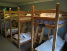 Triple joining timber frame bunk bed with dual stepped ladder access and joins (room Gulhisch). This