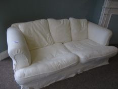 White upholstered two seat sofa (room Myrddin)
