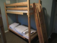 Timber frame bunk bed with stepped ladder access (room Geridven). This lot is likely to require some