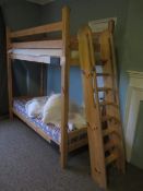 Timber frame bunk bed with stepped ladder access (room Gulhisch). This lot is likely to require some