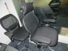 Two swivel & tilt mesh back elbow chairs