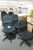 Six black cloth upholstered chairs