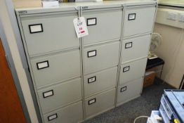 Three 4 drawer steel filing cabinets