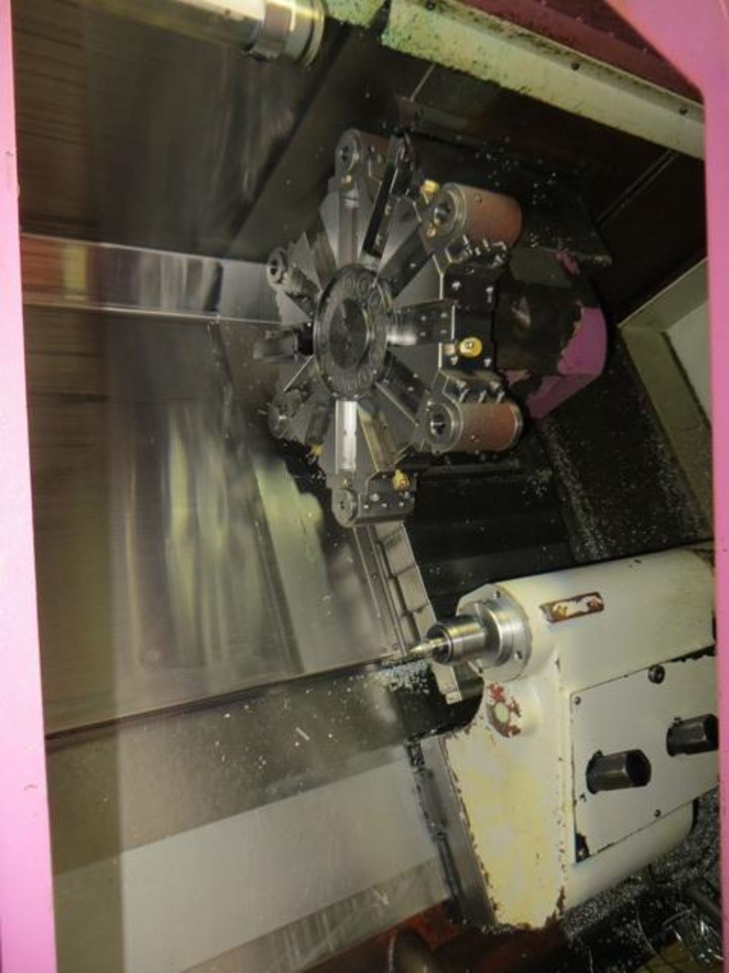 Yang ML-300 CNC lathe with control and Fonge residue discharge conveyor Year: c.2000 c/w two tool - Image 4 of 9
