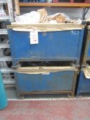 Two steel stillages and contents to include white radiator brackets. (Please note: this lot must