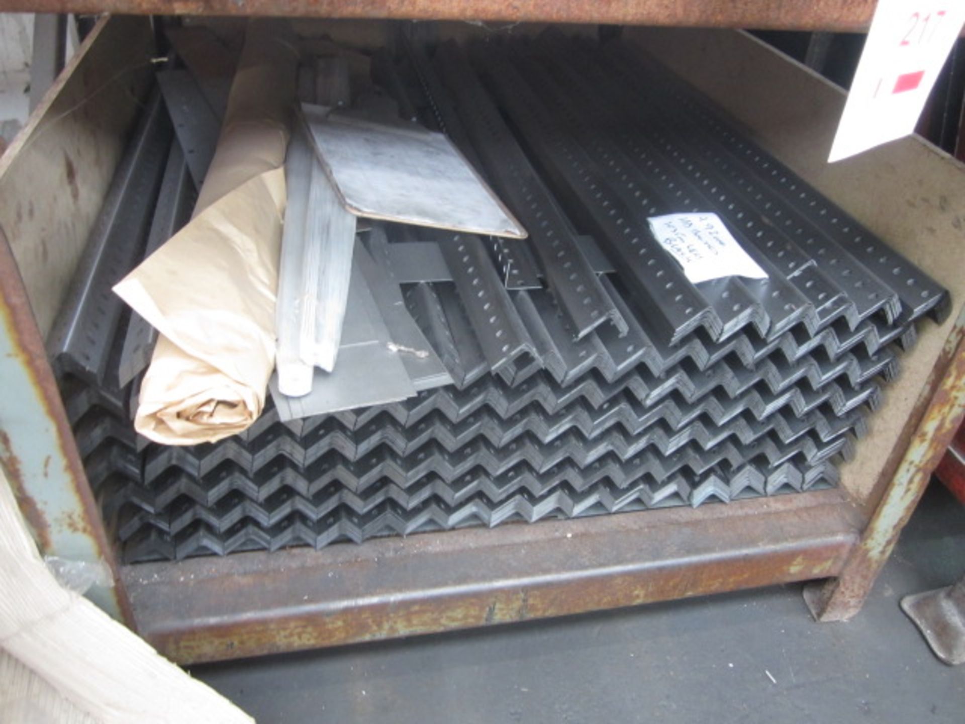 Three steel stillages and contents including assorted bolted racking uprights. (Please note: this - Image 4 of 4