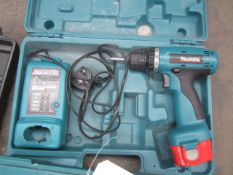 Makita cordless drill, charger, carry case