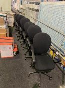 7 x black swivel and tilt office chairs in black cloth