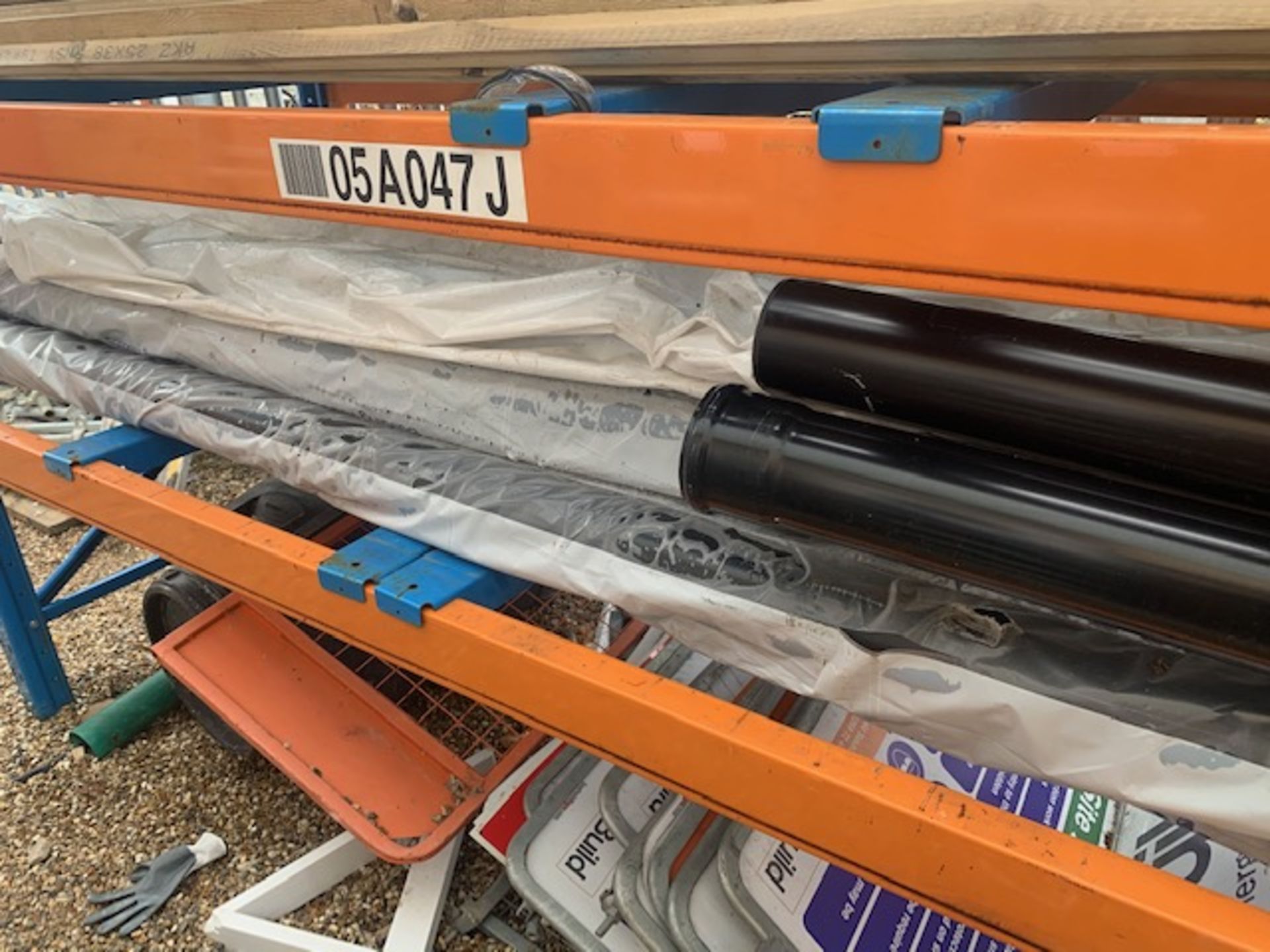 Contents of racking to include various size timber lengths, plastic pipe, scaffold advertising - Image 4 of 9