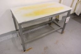 Stainless steel frame/nylon topped cutting table, approx 1200 x 600mm