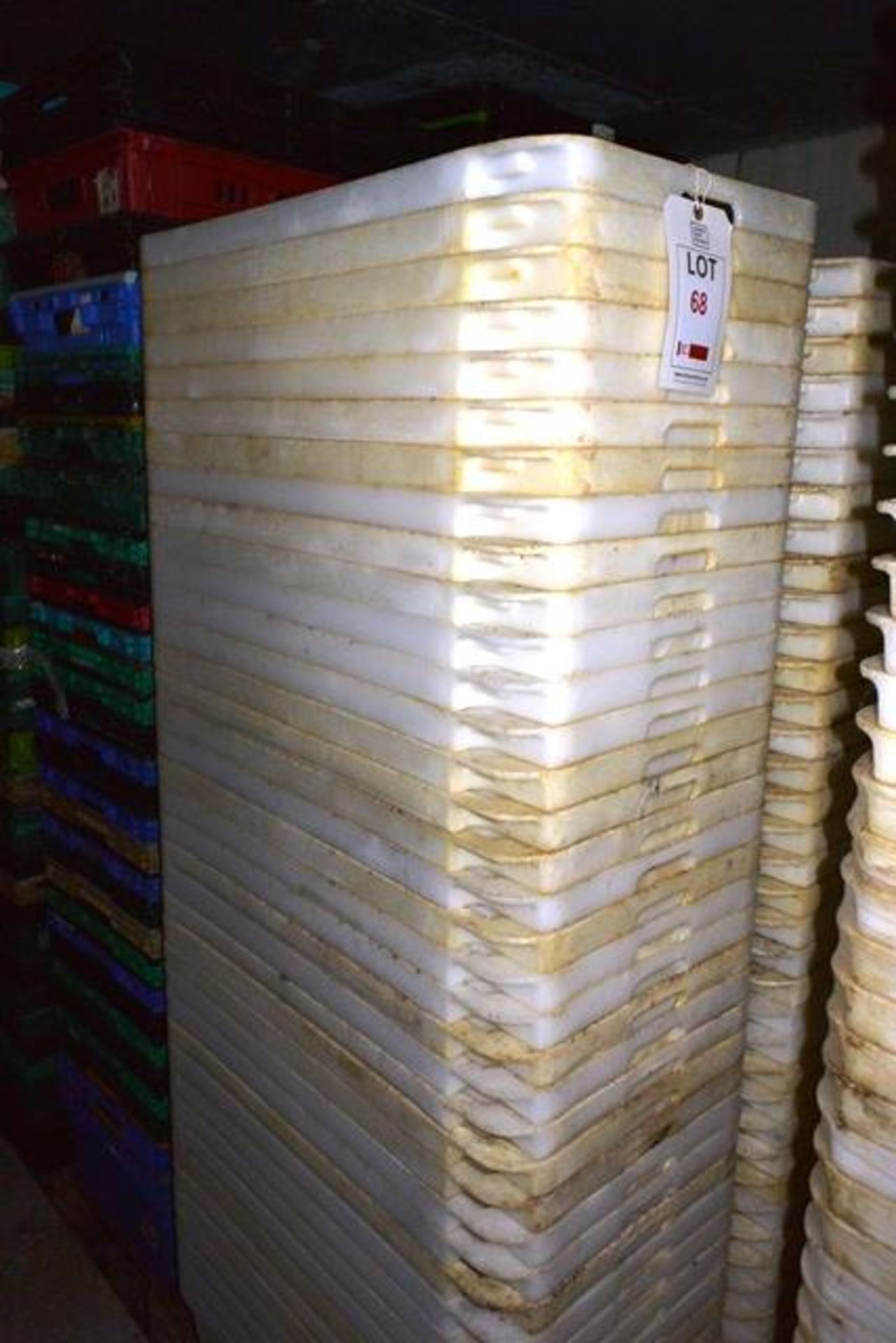 Pallet and contents including large quantity of plastic crates