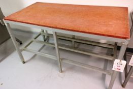 Stainless steel frame/nylon topped cutting table, approx 1550 x 760mm