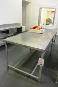 Stainless steel topped/steel frame table, approx 2800 x 900mm