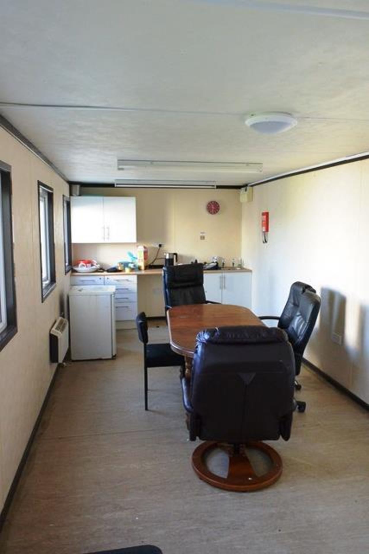 Loose contents of snack/kitchen area incl. table, chairs, kettle, fridge, etc.