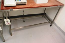 Stainless steel frame/nylon topped cutting table, approx 1550 x 600mm