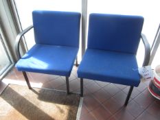 Two blue cloth upholstered reception chairs