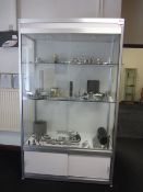 Glass fronted 2 shelf display cabinet and contents