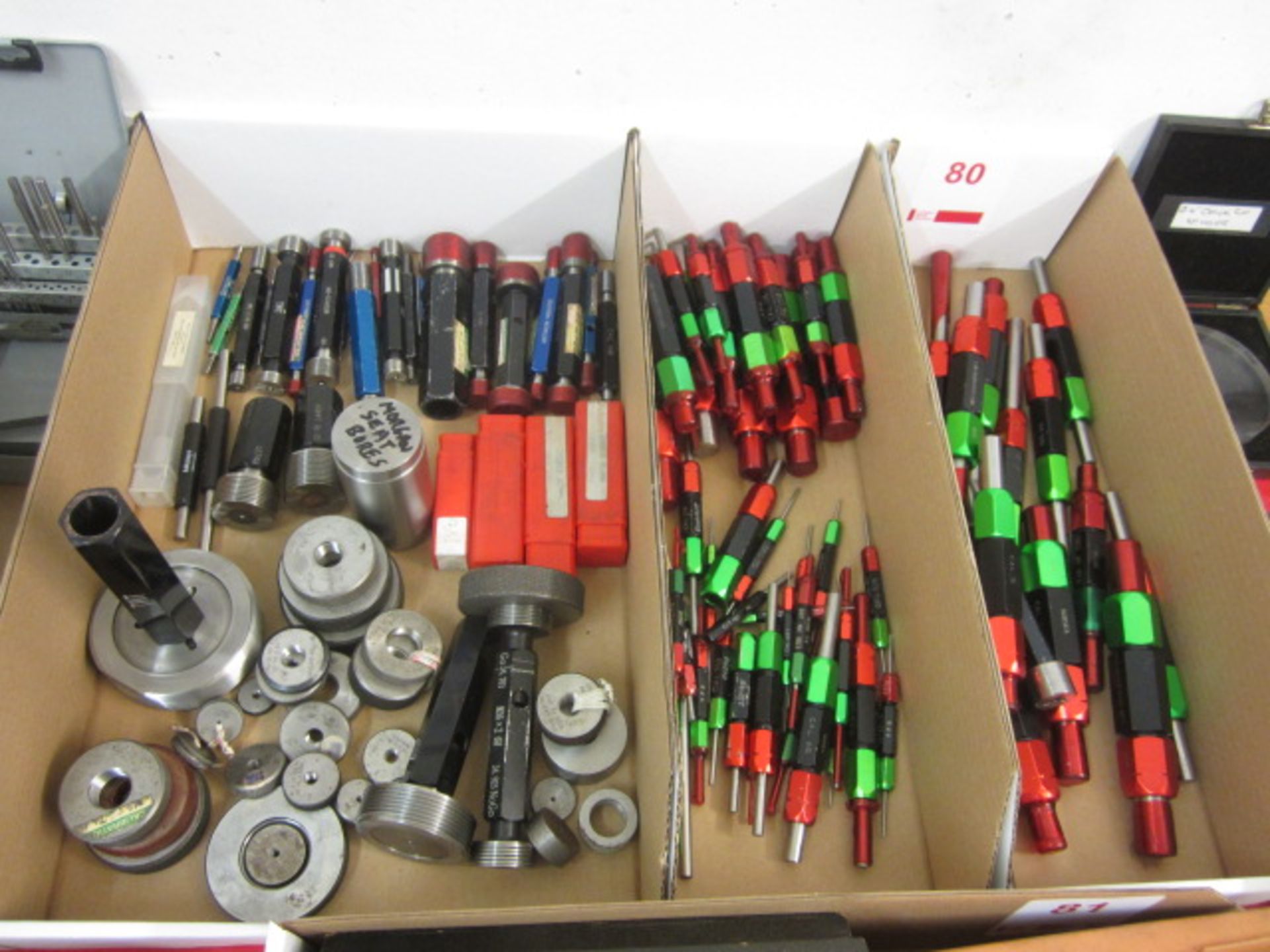 Three boxes of plug gauges