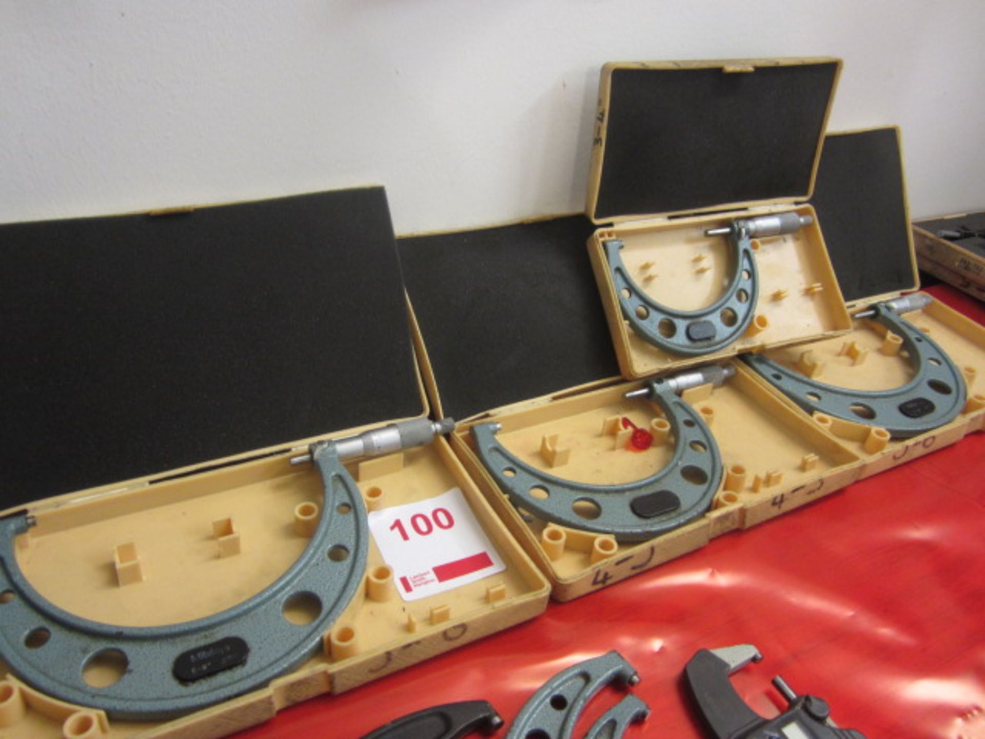 Four Mitutoyo micrometers (2 x 5-6", 1 x 4-5", 1 x 3-4")