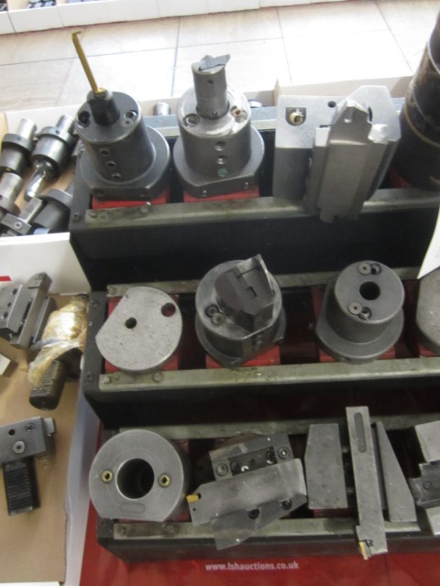 Hss Hardware Rack Tool rack and contents to include assorted HSS tool holders and tooling ...