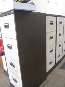 Three 4-drawer steel filing cabinets