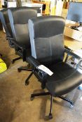 Three black leather effect office swivel chairs