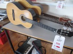 Tom & Will acoustic guitar. Located at main schoolPlease note: This lot, for VAT purposes, is sold