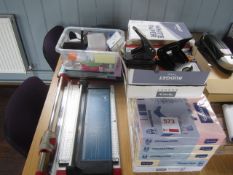 Miscellaneous lot including 2 x paper guillotines, A4 paper, A4 colour paper, staplers, hole punches