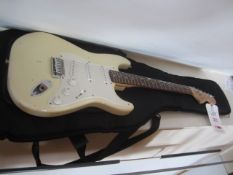 Squier Strat by fenders electric bass guitar. Located at main schoolPlease note: This lot, for VAT