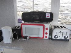 Microwave, 700w, 4 slice & 2 slice toasters, cassette player. Located at main schoolPlease note: