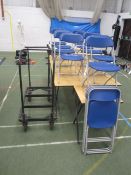 10 x wood effect folding exam tables, 11 x folding chairs, table stacking trolley. Located at main