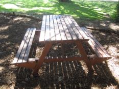 Timber slatted picnic table and bench seating. Located at main schoolPlease note: This lot, for