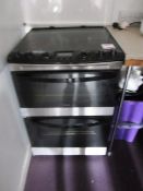 Zanussi 4 ring electric double oven cooker - disconnection to be undertaken by purchaser. Located at