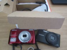 2 x digital cameras. Located at Church FarmPlease note: This lot, for VAT purposes, is sold under