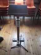 Wooden music sheet stand and guitar stand. Located at main schoolPlease note: This lot, for VAT