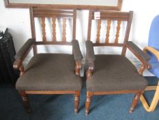 2 x darkwood effect framed upholstered seat chairs. Located at main school