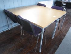 2 x metal frame lightwood effect tables with 4 x upholstered chairs. Located at 6th form