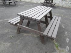 Heavy duty plastic slatted picnic table and bench seating. Located at 6th form premisesPlease