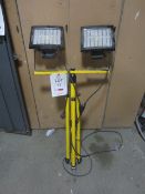 Twin LED site lamp, 240v. Located at main schoolPlease note: This lot, for VAT purposes, is sold