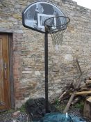 Spalding basketball hoop with water fill base. Located at main schoolPlease note: This lot, for