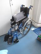 Aidapt folding wheel chair. Located at main school. Please note: This lot, for VAT purposes, is sold