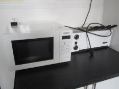 Roulett 4 slice toaster and Bosch microwave. Located at main school