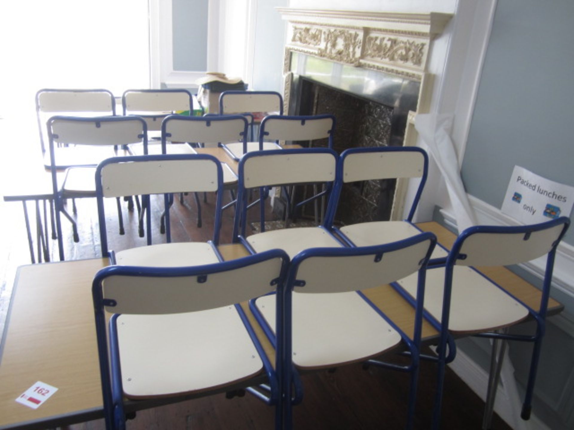 3 x folding tables with 18 chairs. Located at main school