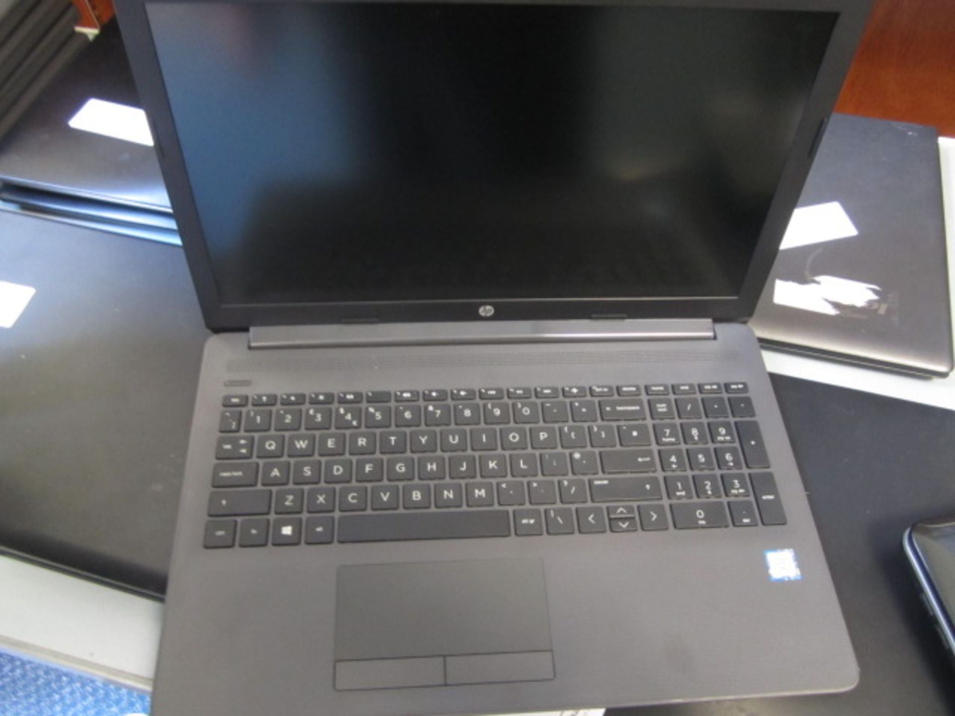 HP 250 G7 Core i5 laptop and case. Located at main schoolPlease note: This lot, for VAT purposes, is