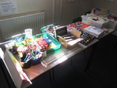 Miscellaneous lot including pens, glue sticks, mathematical board games and training aids, clocks,