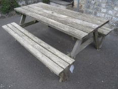 Timber slatted picnic table and bench seating. Located at Church FarmPlease note: This lot, for