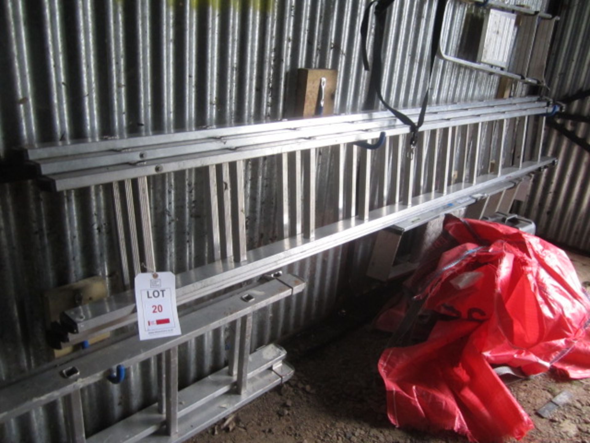 Aluminium triple extension ladder. Located at main schoolPlease note: This lot, for VAT purposes, is