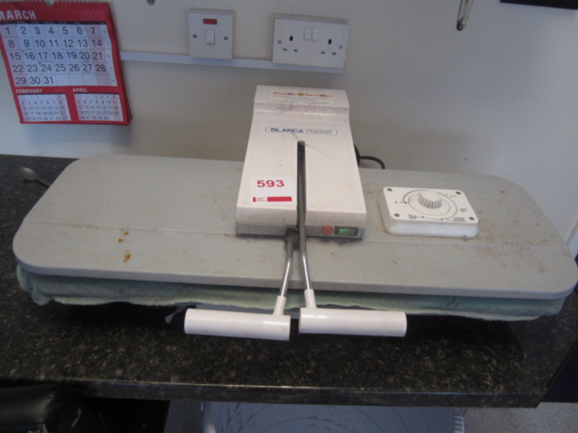 Blanco Press counter top clothes press, 2 x ironing boards, various laundry baskets. Located at